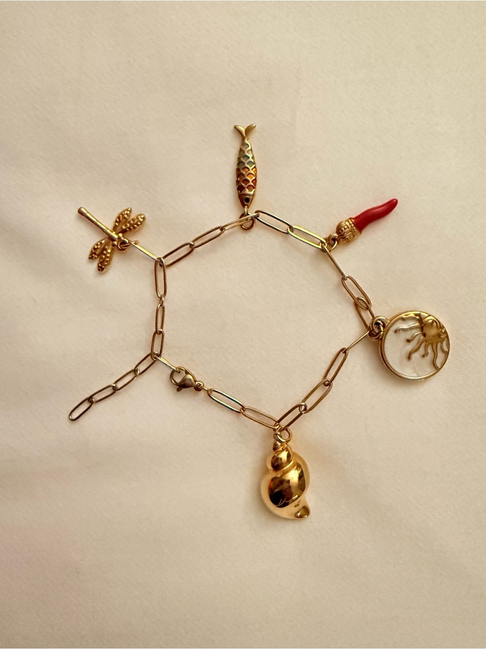 Gold Charm Bracelet with Red Coral Accent and Shell Charms